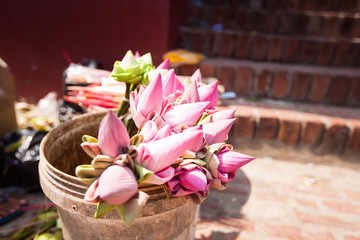 Offerings to gods in  temple with flowers and aroma sticks