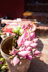 Offerings to gods in  temple with flowers and aroma sticks