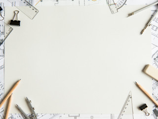 Architectural plans, pencil and ruler on the table. Place for your text