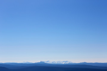 blue color of mountains at dawn , Russia, Siberia
