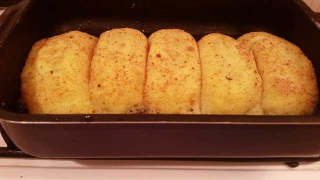Appetizing cutlets from potato stuffed with mushrooms are fried in vegetable oil