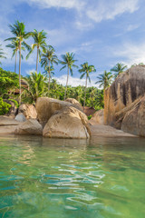 Fototapeta na wymiar Beautiful stones on beach. Coral Bay, Koh Samui, Thailand. Exotic holidays
