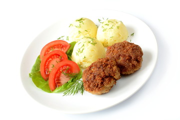 kotlet mielony z ziemniakami i pomidorem