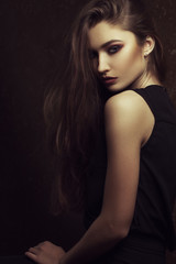 fashion portrait of elegant woman with perfect provocative make up. Studio shot