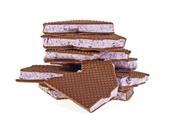 Blueberry nougat in chocolate on a white background