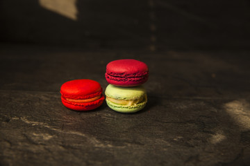 macarons on black table