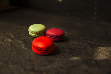 macarons on black table