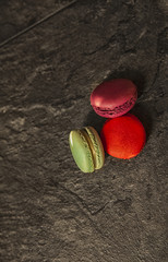 macarons on black table