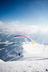 Winter paragliding in Gudauri mountains