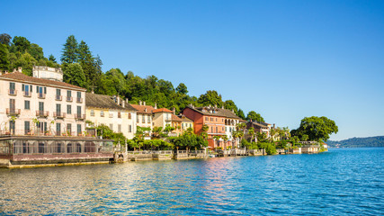 View of Motta square on Orta San Giulio from a touristic boat, Lake Orta, Piedmont, Italy