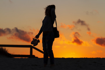 Sandals and girl silhouettes