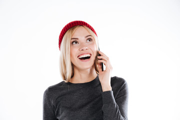 Happy excited woman talking on mobile phone and laughing