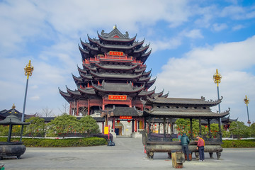 CHONGYUANG TEMPLE, CHINA - 29 JANUARY, 2017: Beautiful red and black tower with stunning chinese architecture, seen from medium distance on a nice sunny day