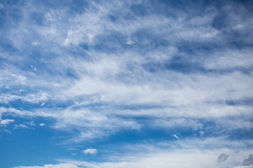 Naklejka na ściany i meble Blue sky with white fluffy clouds. Sky daylight. Natural sky composition.