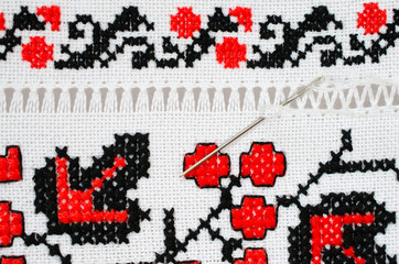 Slavic red and black embroidery by cross-stitch.