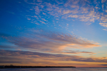 Winter sunset over the ocean ice in rural Prince Edward Island, Canada.