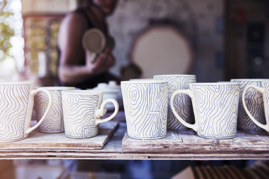 Ceramic mugs in studio