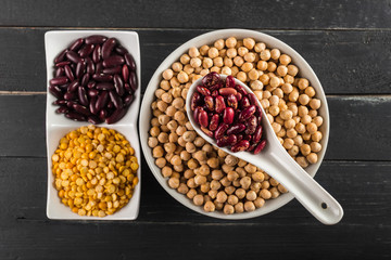 mix of beans on wooden table