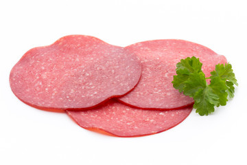 Salami smoked sausage one slice isolated on white background cutout.