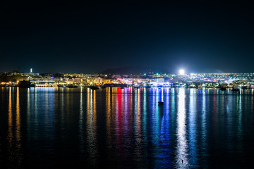 Fototapeta premium Night city and embankment in Naama Bay, Egypt