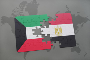 puzzle with the national flag of kuwait and egypt on a world map