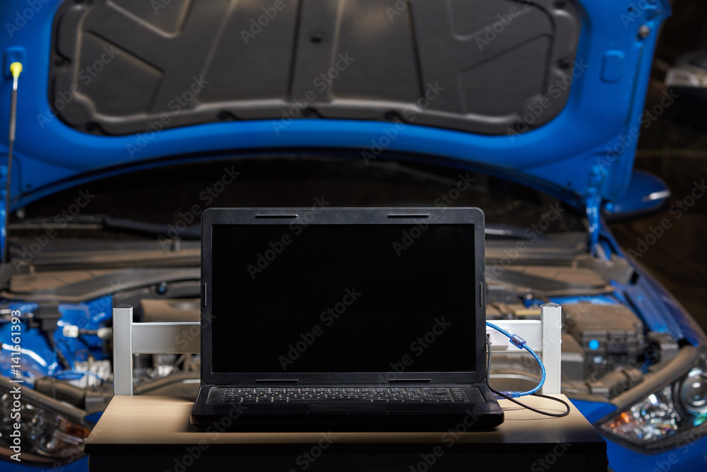 Wall mural Laptop for computer car diagnostic