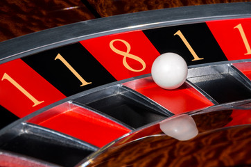 Concept of casino roulette lucky numbers wheel black and red sectors