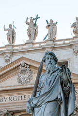 Obraz premium Statue of Saint Paul, the Apostle, in front of the Papal Basilica of St. Peter in the Vatican