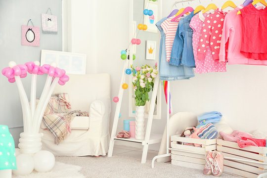Beautiful interior of child's room decorated for birthday celebration