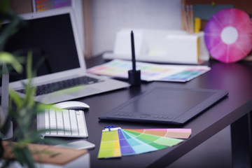 Naklejka premium Modern workplace of designer with modern devices