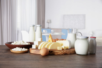 Different dairy products on kitchen table