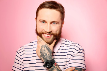 Obraz premium Handsome young man on pink background