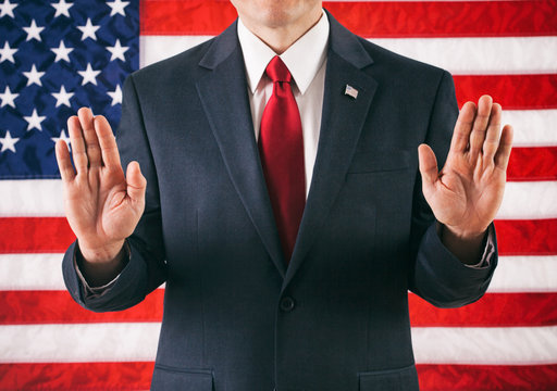 Politician: Man Standing With Hands In The Air