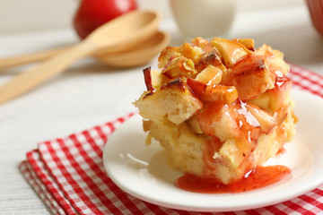 Delicious bread pudding with jam on plate