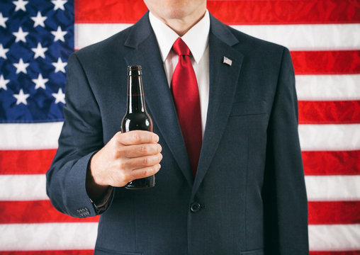 Politician: Man Holding A Bottle Of Beer