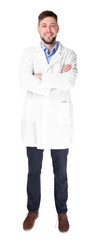 Young handsome pharmacist with crossed arms on white background