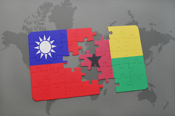 puzzle with the national flag of taiwan and guinea bissau on a world map