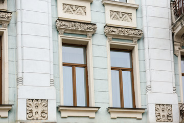 Fototapeta na wymiar Ornate building with vintage windows