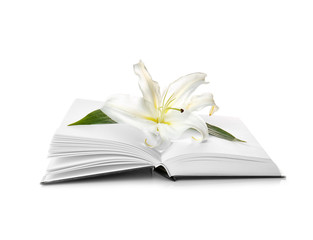 Holy Bible and Easter white lily on white background