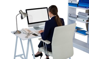 Businesswoman working on computer