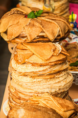 A huge stack of pancakes while celebrating Russian Shrovetide (pancake week)