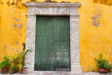 Fototapeta na wymiar Entrance of the Holy Trinity Church in the Getsemani neighborhood of Cartagena, Colombia.