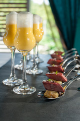 Pigeon breasts with grape confit. Pumpkin veloute with garlic mousse.