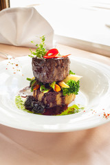 Smoked grilled beefsteak on roasted ciabatta, fresh vegetables and blackcurrant and plum sauce
