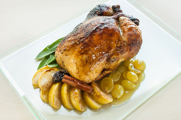 Stuffed goose with apples and grapes