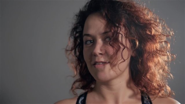 Sexy pole dancer portrait, happy smiling woman