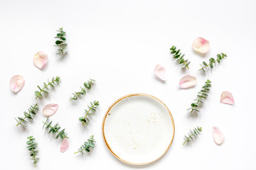 woman table with flower and herbs top view white background mock up