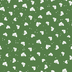 Saint Patrick's Day seamless pattern. Clover leaf and golden dots. Abstract holiday background
