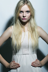 young magnificent woman in white dress.