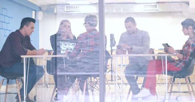 Creative Business Team Meeting In Modern Start Up Office